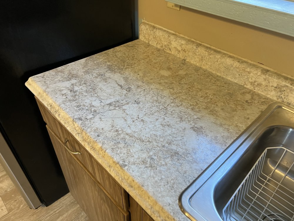 Slide of McQueens On-The-Go Home & Automobile Cleaning Services