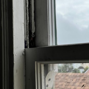 Kaiser Glass - Seriously? Just screws and chewed up wood? - Glass & Mirrors Near Me - San Francisco, California