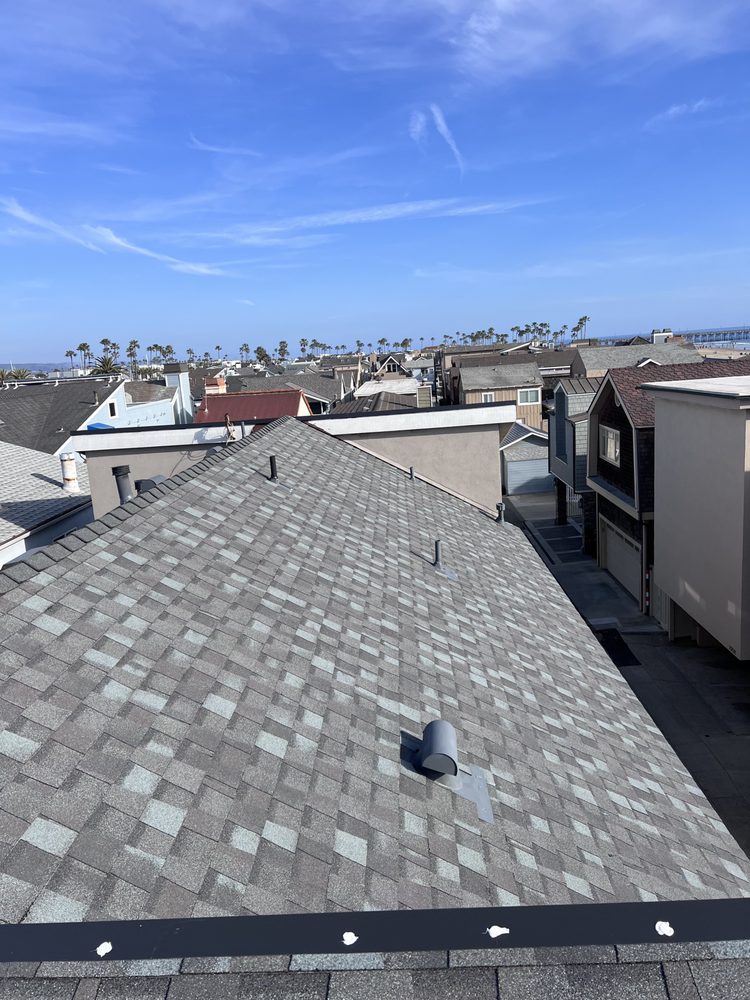 Slide of MC Elite Roofing