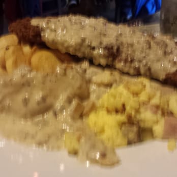The Buttered Biscuit - A little blurry but chicken fried steak (there's a biscuit in there somewhere too!) - New American Near Me - Sumner, Washington The Buttered Biscuit - A little blurry but chicken fried steak (there's a biscuit in there somewhere too!) - New American Near Me - Sumner, Washington