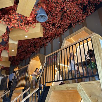 Yoshi Ramen - Ramen shop honeycomb booths for 4-6 and 2. Beautiful flowers on the ceiling hiding the ductwork. - Ramen Near Me - Tega Cay, South Carolina Yoshi Ramen - Ramen shop honeycomb booths for 4-6 and 2. Beautiful flowers on the ceiling hiding the ductwork. - Ramen Near Me - Tega Cay, South Carolina