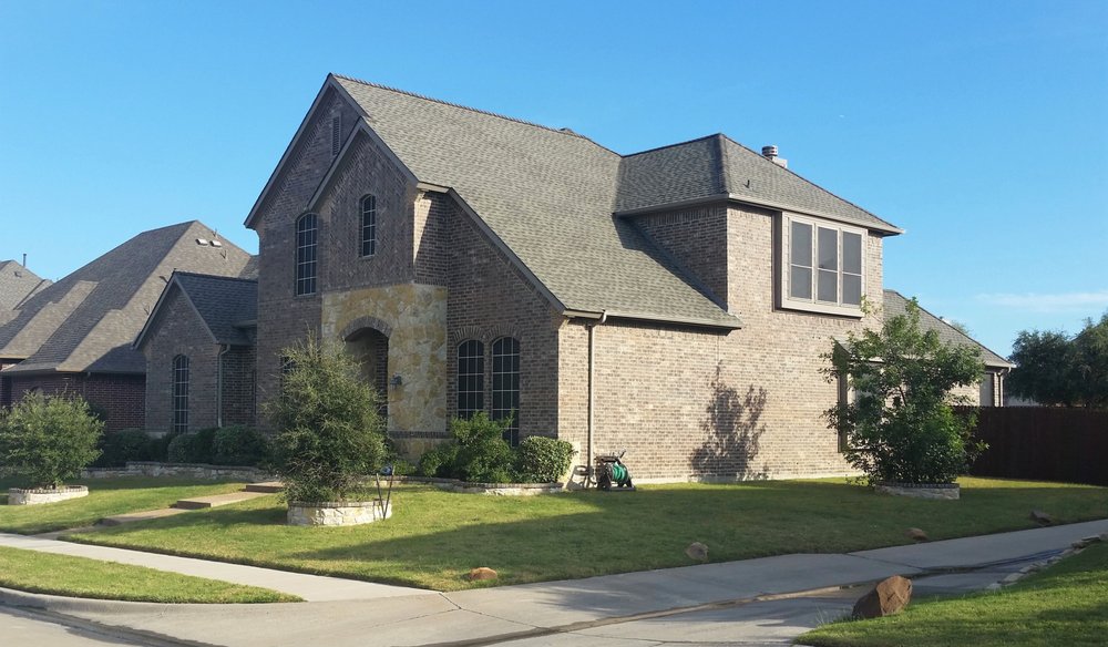 Slide of Reid's Roofing