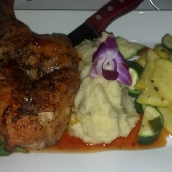 Paradise Beach Grille - Fire roasted half chicken...with honey chipotle sause - New American Near Me - Capitola, California Paradise Beach Grille - Fire roasted half chicken...with honey chipotle sause - New American Near Me - Capitola, California