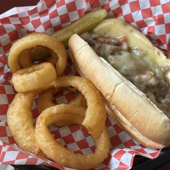 Victory Kitchen & Restaurant - Cheesesteak sandwich with lightly battered onion rings. - American Near Me - Lake Lure, North Carolina