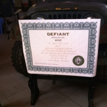 Blue Ridge Distilling - a certificate on a chair - Distilleries Near Me - Bostic, North Carolina