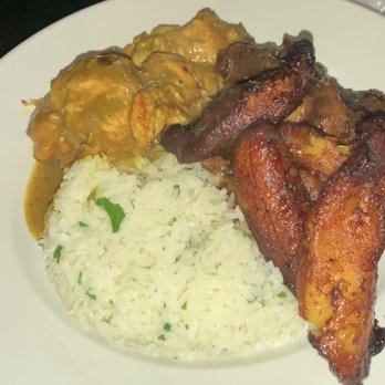 Chef Rob's Cafe & Bar - Combination (Curry Chicken and Braised Beef Oxtails) - Caribbean Near Me - Atlanta, Georgia Chef Rob's Cafe & Bar - Combination (Curry Chicken and Braised Beef Oxtails) - Caribbean Near Me - Atlanta, Georgia