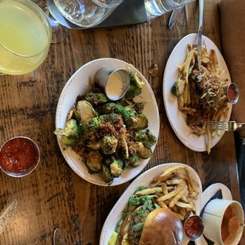 StillWest Brewery & Grill - All of our plates. Hamburger, steak, Brussels sprouts, tomato soup, and black bean burger - Brewpubs Near Me - Jackson, Wyoming