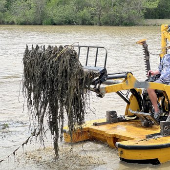 Weed Out - a man in a yellow boat - Environmental Testing Near Me - Youngsville, Louisiana