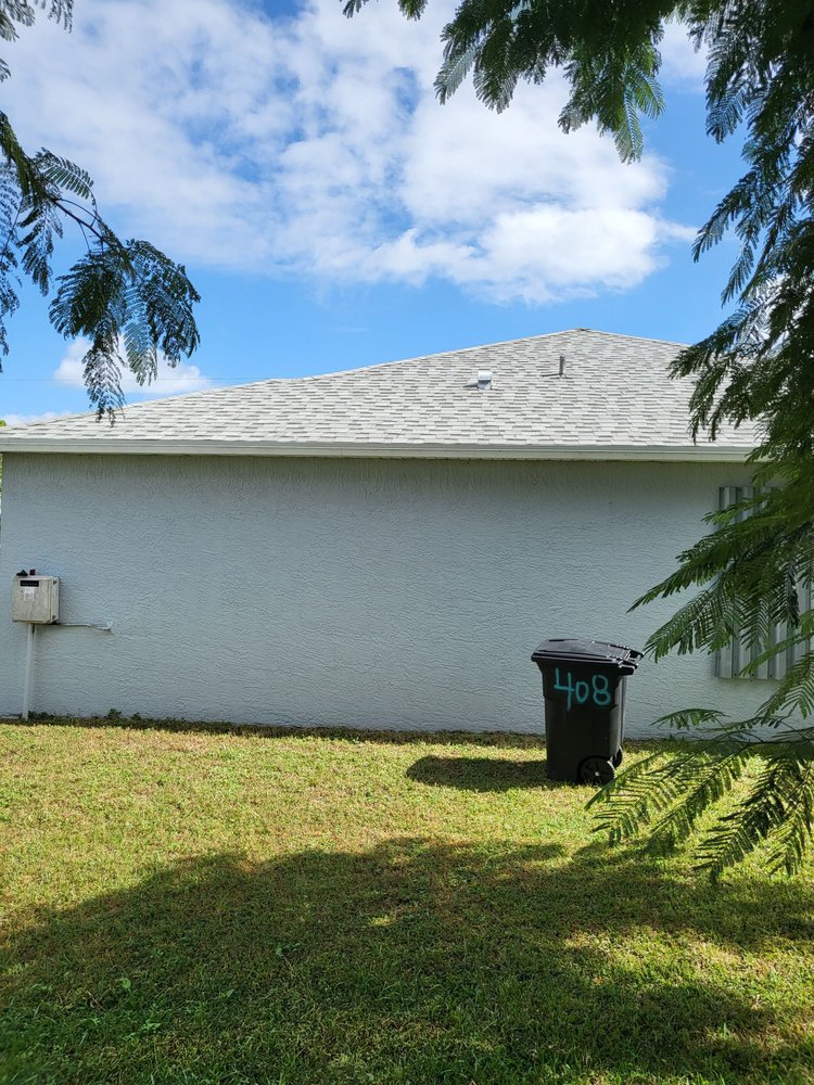 Slide of Treasure Coast Roofing