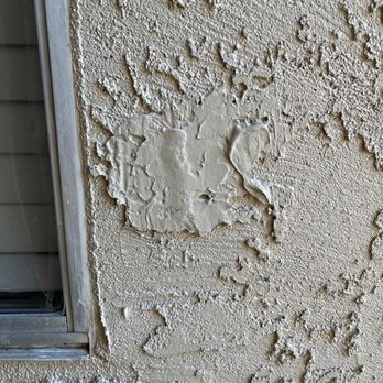Advanced Coatings Painting - Patch done with caulk... by the front door - Painters Near Me Advanced Coatings Painting - Patch done with caulk... by the front door - Painters Near Me
