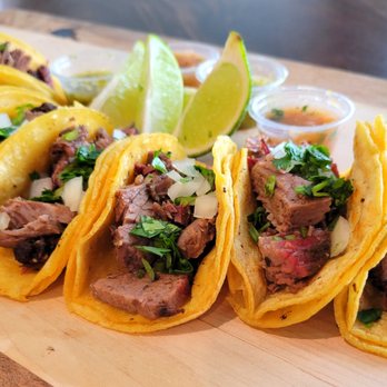 Barbacoa TX - a variety of tacos on a cutting board - Food Trucks Near Me - Dallas, Texas Barbacoa TX - a variety of tacos on a cutting board - Food Trucks Near Me - Dallas, Texas