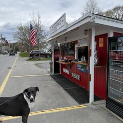 Dunton's Doghouse - The shop with a friend waiting for some scraps.