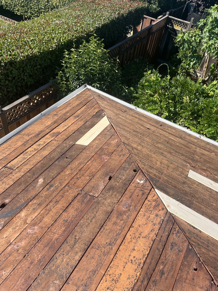 Slide of Fredy's Roofing