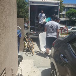 Movers with masks on! Movers with masks on!