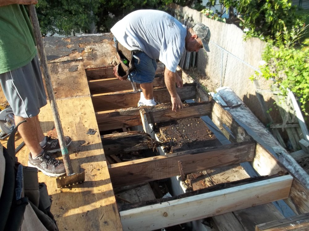 Slide of J K Behan Roofing