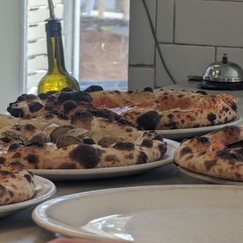 2 Amys Neapolitan Pizzeria - Pizza coming out of the brick oven. - Pizza Near Me - Washington, DC, District of Columbia