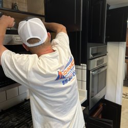 Advanced Painting Systems - Finishing up cabinet job in Loomis CA