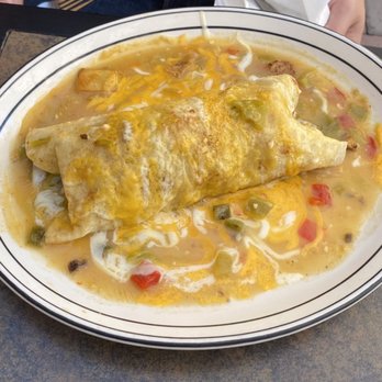 Pepper Pot - Chorizo burrito, smothered in green sauce - Mexican Near Me - Hatch, New Mexico Pepper Pot - Chorizo burrito, smothered in green sauce - Mexican Near Me - Hatch, New Mexico