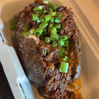 True Texas BBQ - Brisket loaded potato - Barbeque Near Me - Austin, Texas
