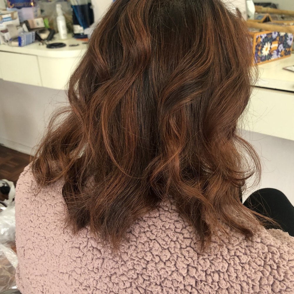 Brownish with a slight red highlight Brownish with a slight red highlight