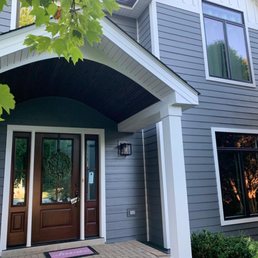 New siding, portico, front door, Anderson windows