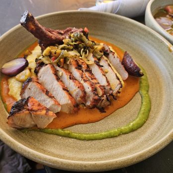 Lamplight Lounge - Chefs special Pork Chop with Polenta - New American Near Me - Anaheim, California