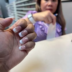 Amie's Nails - This was my nail tech today but as you can see from far my nails look okay but not close detail . Catfished