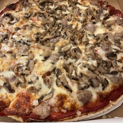 Dr Benzie's Pizza - 14" thin crust with 4 toppings. YUM