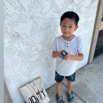Lofty Learning Studios - My son with the plant he planted and little plater he painted at Lofty! - Tutoring Centers Near Me - Fountain Valley, California