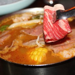 The Bronze Empire - Added the meat which we cooked for about 45 seconds.
