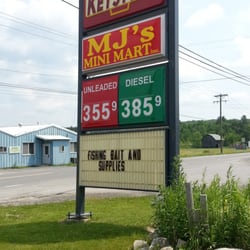Mj'S Mini Mart - Sign out front.