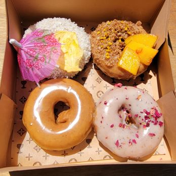 Holey Grail Donuts - Top Left: The Tourist, Hot Peach; Bottom Left: Original Sin, Hail Mary - Donuts Near Me - Long Beach, California Holey Grail Donuts - Top Left: The Tourist, Hot Peach; Bottom Left: Original Sin, Hail Mary - Donuts Near Me - Long Beach, California