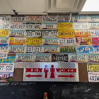 Shane's Pizza On 87 - Decorative license plate on wall outside restrooms - Salad Near Me - Chandler, Arizona Shane's Pizza On 87 - Decorative license plate on wall outside restrooms - Salad Near Me - Chandler, Arizona