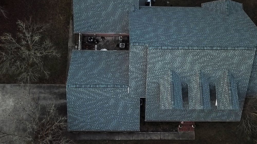 Slide of Action Roofing