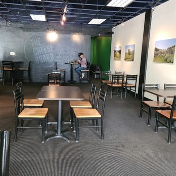 The Cheese Board - Spaced out tables. - American Near Me - Reno, Nevada The Cheese Board - Spaced out tables. - American Near Me - Reno, Nevada