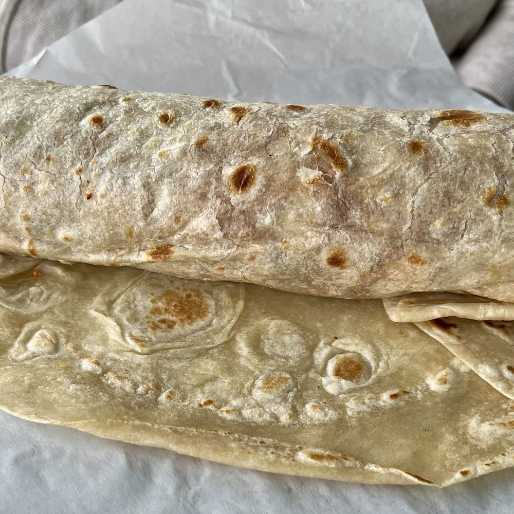 Charittos - Huge chorizo egg potato and cheese breakfast burrito. - Tacos Near Me - Casper, Wyoming Charittos - Huge chorizo egg potato and cheese breakfast burrito. - Tacos Near Me - Casper, Wyoming