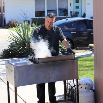 Jennios Taco Catering - Jose G. grilling away. - Caterers Near Me Jennios Taco Catering - Jose G. grilling away. - Caterers Near Me