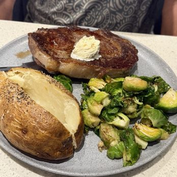 Seasoning Bistro - Ribeye steak, baked potato, brussel sprouts - Seafood Near Me - Marion, Illinois Seasoning Bistro - Ribeye steak, baked potato, brussel sprouts - Seafood Near Me - Marion, Illinois