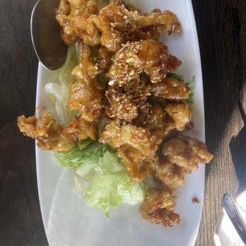 Sukho Thai - Crispy Garlic Chicken Stir Fried - Thai Near Me - Bellevue, Washington Sukho Thai - Crispy Garlic Chicken Stir Fried - Thai Near Me - Bellevue, Washington