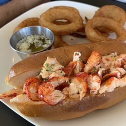 Eddies Italian Cafe - Lobster roll with side of onion rings. And warm butter!
