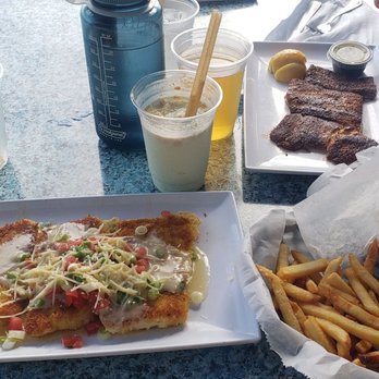 Lazy Days Restaurant - Mahi-mahi lazy days style (closer) and blackened (further), fries, key lime colada - Seafood Near Me - Islamorada, Florida