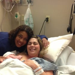 Birth & Baby Matters - Admiring this 30 min old beautiful baby boy's perfect self latch after his c-section delivery and his proud mama!
