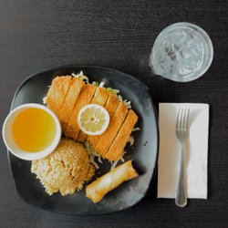 United Chinese Restaurant - Lemon chicken with fried rice on a bed of letruce witha cheese wonton and veggie spring roll