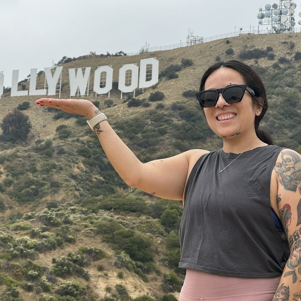 Hollywood Hikes - Holding the sign - Walking Tours Near Me Hollywood Hikes - Holding the sign - Walking Tours Near Me