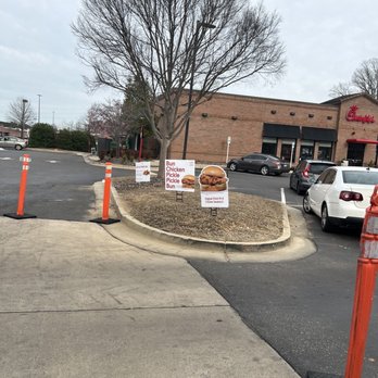 Chick-fil-A - ows a parking lot with signs and a fire hydrant - Fast Food Near Me - Irondale, Alabama