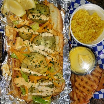 The Seafood Xperience - Shrimp poboy with garlic butter rice and waffle fries - Seafood Near Me - Los Angeles, California