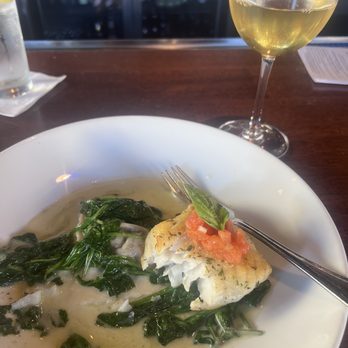 Koberl At Blue - The most delicious Herb Roasted Halibut over a Wild Mushroom Ravioli, Sautéed Spinach, and a mouth watering Basil Vermouth Sauce. - New American Near Me - San Luis Obispo, California Koberl At Blue - The most delicious Herb Roasted Halibut over a Wild Mushroom Ravioli, Sautéed Spinach, and a mouth watering Basil Vermouth Sauce. - New American Near Me - San Luis Obispo, California