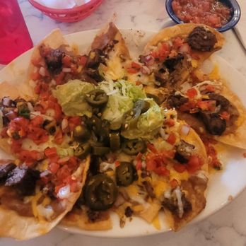 Chuy's - Ponchos with fajita beef - Tex-Mex Near Me - Birmingham, Alabama Chuy's - Ponchos with fajita beef - Tex-Mex Near Me - Birmingham, Alabama