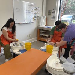 Suwanee Clayworks - Cole helping our special guests.