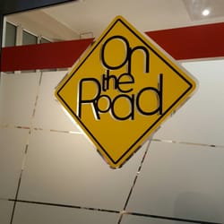 On the Road - Insegna